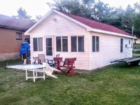 Waterfront house with sandy beach near downtown Hotels in Roscommon County