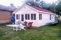 Waterfront house with sandy beach near downtown