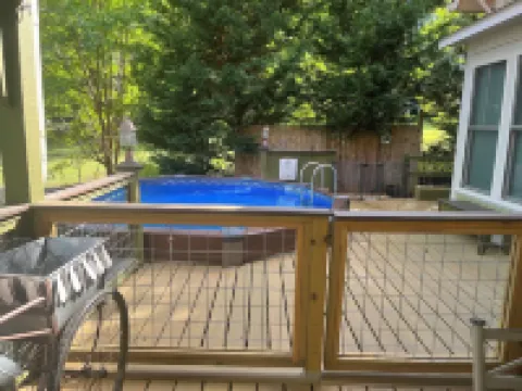 Captain’s Cove Lake Cottage with Dock, Pool, & Game Room