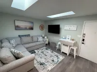 Cozy and Clean Boardwalk/Beach Block Condo with Parking and Pool