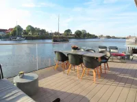 Pfahlhaus Perle am Yachthafen Carolinensiel Harlesiel ❤️, Living on the water Hoteles en Wittmund