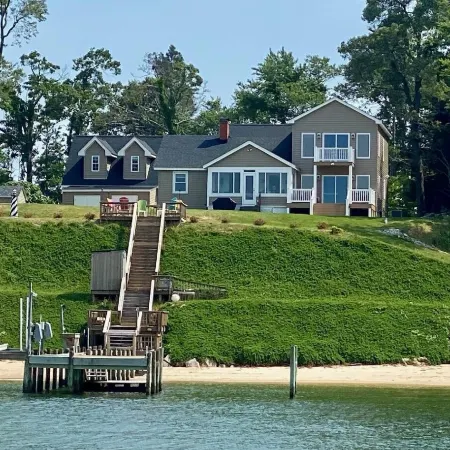 Room on river with sunset views and private beach!