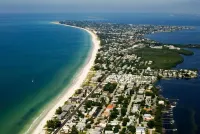 Completely remodeled beach front condo with full ocean views, steps to the water
