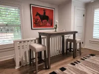 Garage apartment central to all activities.