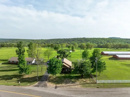 Historic Early Settler Farm House that Has Been Modernized For Your Comfort.