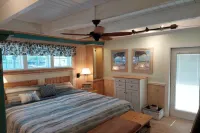 Beautiful Waterfront Hideaway Gem on Bessy Creek w/ Swim Spa, Tiki Bar Boat Lift