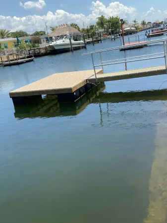 4 bedrooms home located on the deep water canal 13630 Garris Dr. Hudson Fl 34667