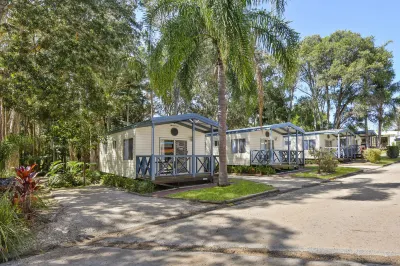 Flynns Beach Caravan Park Hotels near Tacking Point Lighthouse