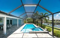 Tranquility Waterfront Villa with Pool & Dock - Beach