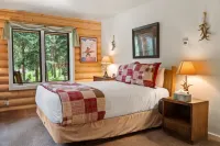 Spacious Deck by Year-Round Creek - Charming Blue River Cabin