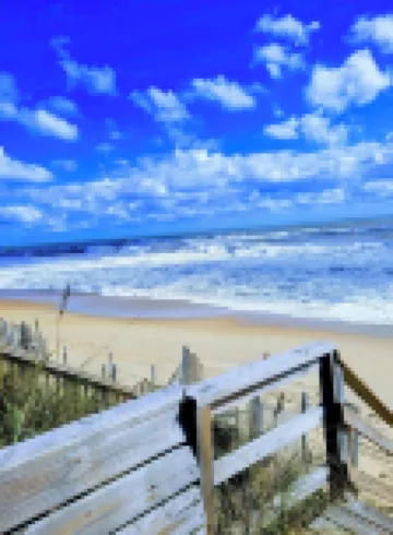 Secret Garden Retreat Steps from the Beach in the Heart of Duck!