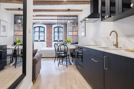 Miodowa Faktoria #7 by Rentoom Отели рядом с достопримечательностью «Дом Николая Коперника»