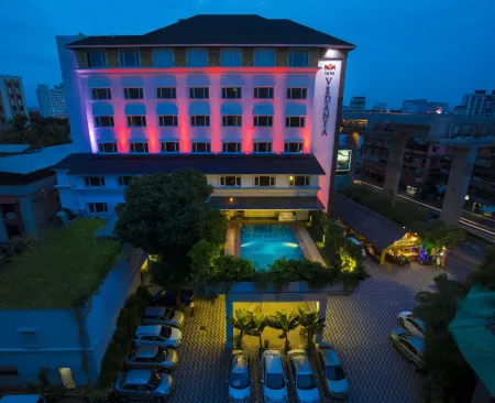 The PGS Vedanta Отели рядом с достопримечательностью «Керала Хай Корт»