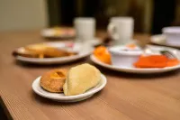 誇烏特莫克坎波門諾温德姆麥客達套房酒店 - 早餐