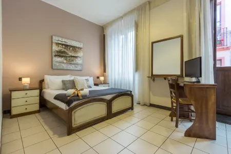 Arcobaleno Rooms Отели в г. Кальяри