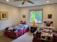 Charming Cabin with Deck and Fireplace - Serene Woodland Escape Hotels in Plum Lake