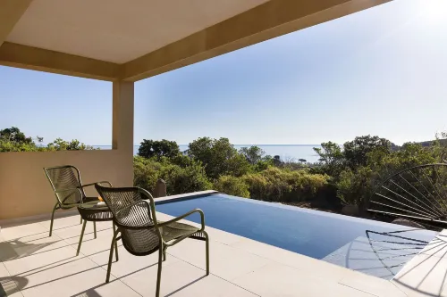 Hôtel A Cala - Suites Piscines privées et Vue Mer فنادق في Conca
