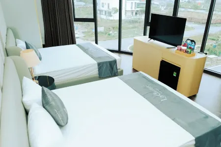 La Garden Hotel Van Don by Bayluxury Отели рядом с достопримечательностью «Yoko Onsen Quang Hanh»