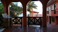 Relaxing beach side condo with mountain and island views.