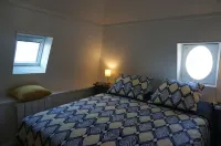 Apartment with View of Portbail Harbor in the Courlis House.