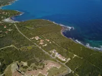 2 bedrooms, 1 living room with kitchen, shower/WC, terraces, Garden, Parking