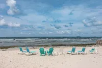 Perfect Beach Front Condo with Pool