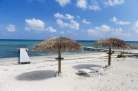 Coco Kai Beach Front Villa with Heated Pool and Private Dock