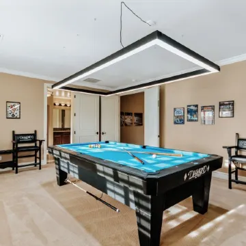 Luxury Retreat With Heated Pool & Hidden Game Room 6 Bedroom Home by RedAwning