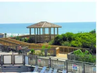 Steps away from the Ocean,  Gym, Gazebos, Indoor/Outdoor  Pools, & Tennis Courts Hotels in Emerald Isle