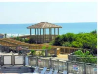 Steps away from the Ocean,  Gym, Gazebos, Indoor/Outdoor  Pools, & Tennis Courts