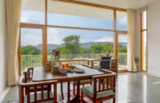 Two-bedroom boutique homestay with a serene view of Lake Lakhawali and Aravalis.