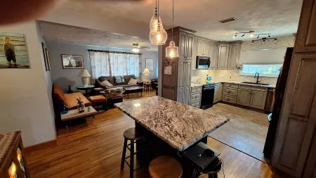 Cozy three bedroom, two bath house. 5 minute walk to the beach.