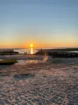 Walk to Rock Harbor Beach from your spacious Orleans coastal retreat