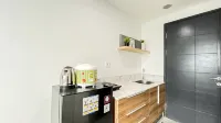Studio Apartment Collins Boulevard near Summarecon Mall Serpong By Travelio