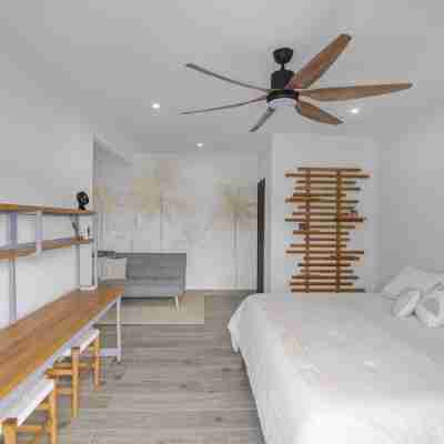 Steps from beach with private pool, rooftop terrace & swim up bar beach club! Rooms