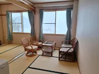Ogura Onsen Ryokan Hotel a 