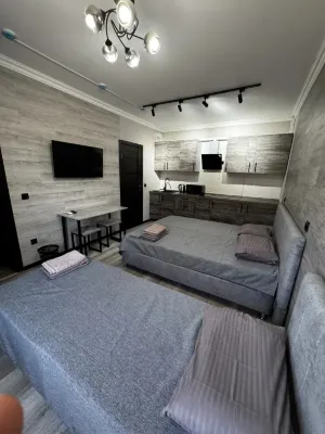 Uyutnyij Dvorik Mini-Hotel Отели в г. 