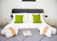 Monolocale Riva – Wi-Fi, Clima e Giardino a Torre Lapillo - 4-Star