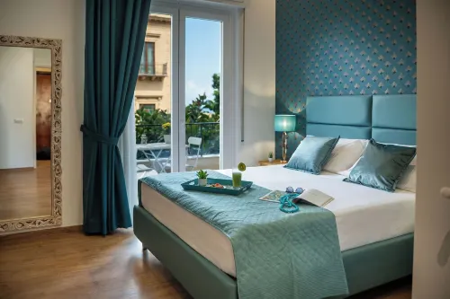 Porta Normanna Charming Rooms - بيت ضيافة