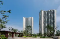 Meet Yunyue Seaview Art LOFT Vacation Apartment (Qingdao Evergrande Golden Beach Store)  호텔