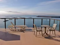 Apartamentos Turísticos Playa de Osmo فنادق في Laxe