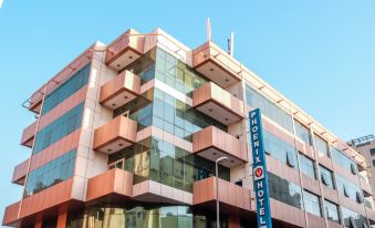 Collection O Phoenix Hotel 객실