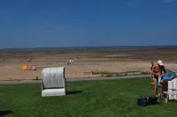 Cottage on park-like grounds with pond Hotels in Nordstrand