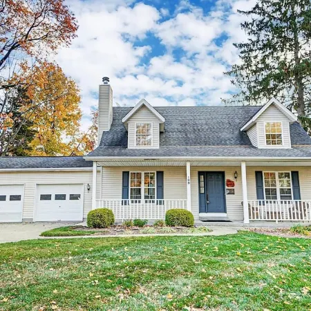 High-end home w/ fireplace, gourmet kitchen, sauna, game rm/ large yard/fire pit