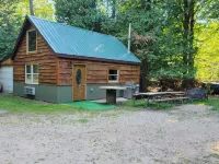 The "Bear Den"  500' Betsie river waterfront Guest home.