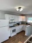 Ranch home with 3 bedrooms upstairs and 1 down. Refurnished June of 2022