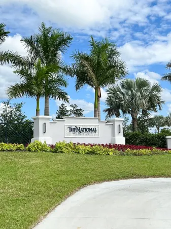 Warm weather year round in brand new coach home with optional golf