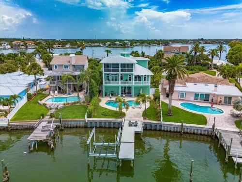 Coastal Elegance: Retreat with Heated Pool, Golf Cart, and Entertainment Haven