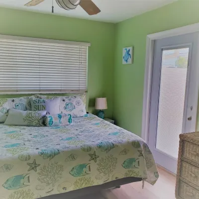 Gulf of Mexico Canal Cottage with Boat Dock and Heated Pool Hotels near Sea Forest Beach Club Homeow