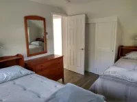 “The Red House”  Family Friendly Vacation Home Close to Beach and Lake Access.